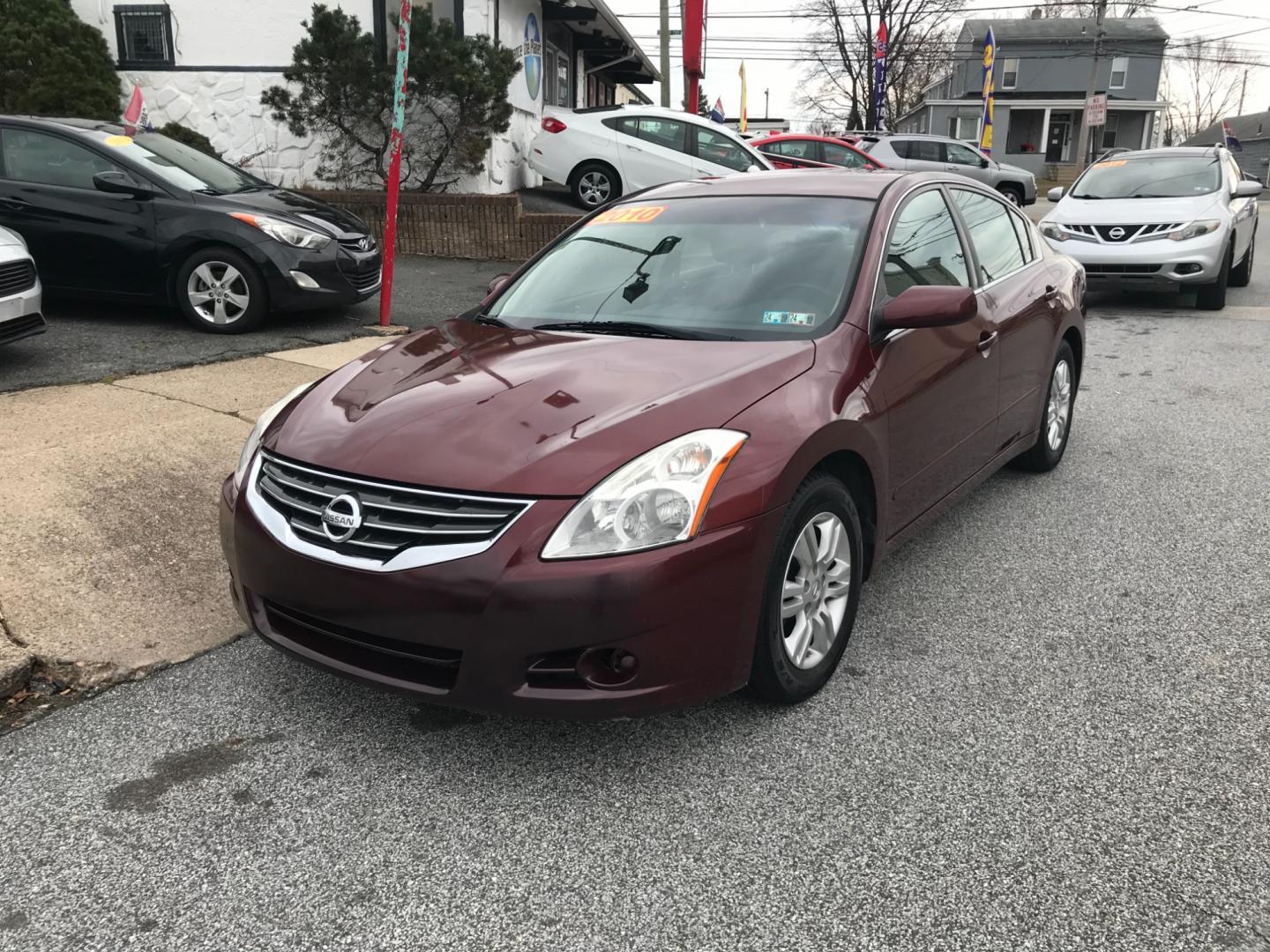 2010 Maroon /Gray Nissan Altima 2.5 (1N4AL2APXAN) , Automatic transmission, located at 577 Chester Pike, Prospect Park, PA, 19076, (610) 237-1015, 39.886154, -75.302338 - Photo#2